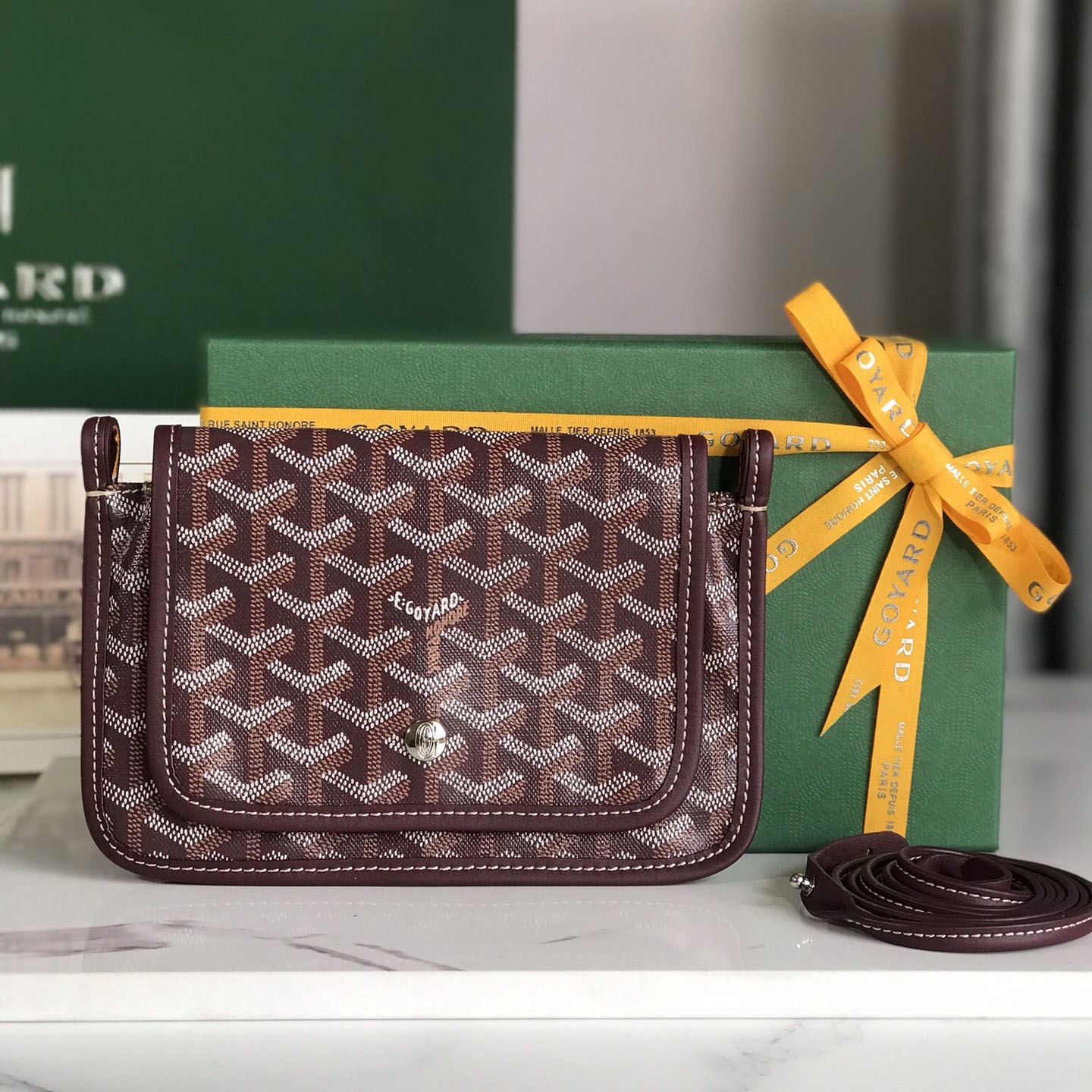 Go*ard clutch bags